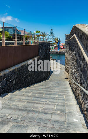 Puerto de la Cruz, Tenerife, Spain - July 10, 2019: . The Old port of town is a popular tourist attraction and favorite place for the locals. Stock Photo