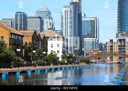 Clippers Quay, looking towards Millwall Outer Dock and Canary Wharf on the Isle of Dogs, east London, UK Stock Photo