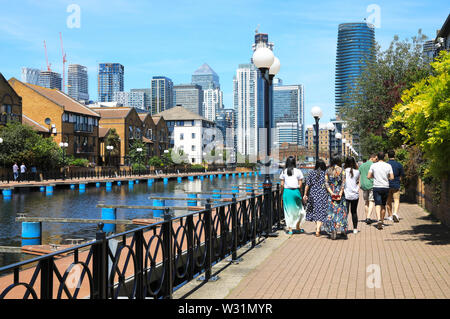 Clippers Quay, looking towards Millwall Outer Dock and Canary Wharf on the Isle of Dogs, east London, UK Stock Photo