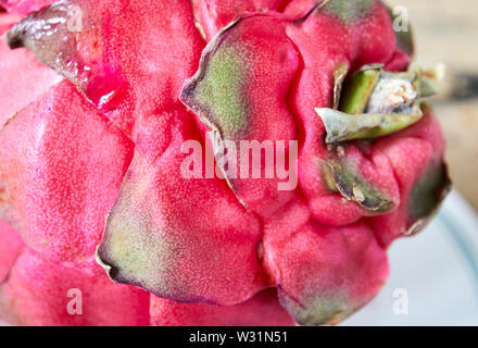 scaly skin of dragonfruit red fruit scales Stock Photo