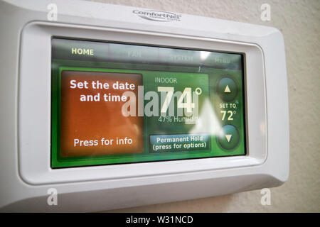 air conditioning heating touch screen control in a house in the USA United States of America Stock Photo