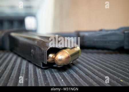 close up of 45 bullets in a magazine at a gun range USA United States of America Stock Photo