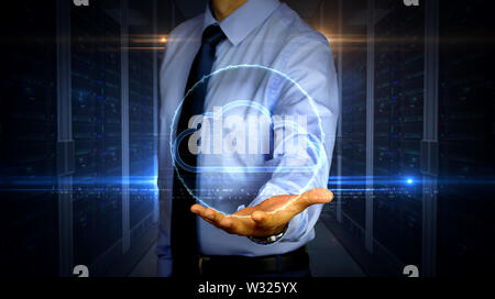 Man with data cloud storage symbol hologram on hand. Businessman showing futuristic concept of digital computing, files storage and online servers wit Stock Photo