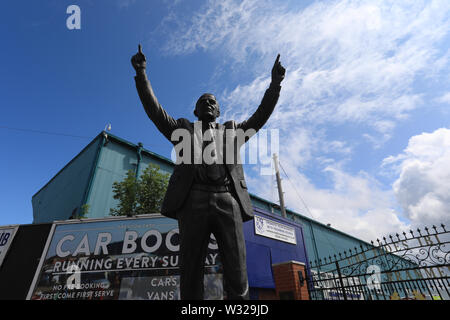 Birkenhead, UK. 11th July, 2019. A general view of the Johnny King statue outside Prenton Park before the Pre-Season Friendly match between Tranmere Rovers and Liverpool at Prenton Park on July 11th 2019 in Birkenhead, England. (Photo by Tony Taylor/phcimages.com) Credit: PHC Images/Alamy Live News Stock Photo