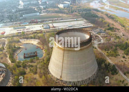Drone flies over the cooling tower, top view Stock Photo