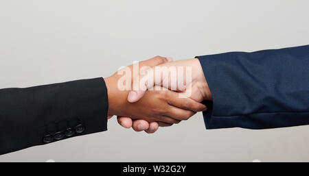 Handshake of multiracial people isolated on white background Stock Photo