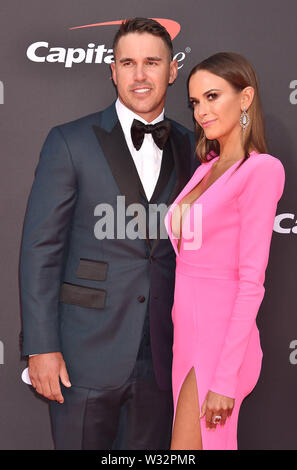 Brooks Koepka and Jena Sims attending the 25th ESPYS held at the ...