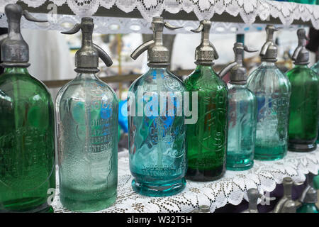Antique siphon bottles in Mercado de San Telmo, the oldest neighbourhood of Buenos Aires, Argentina. Stock Photo