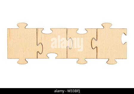 Wooden empty puzzles isolated on white background Stock Photo