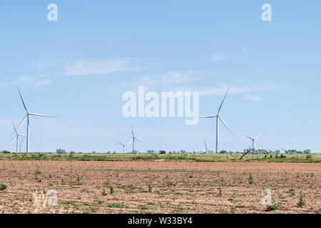 Wind turbine farm generator near Snyder Texas in USA in prairie with many machines for energy Stock Photo