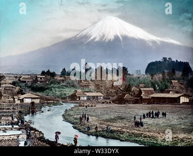 [ 1890s Japan - View on Mt. Fuji ] —   Mt. Fuji as seen from the town of Omiya (also known as Fujinomiya) in Shizuoka Prefecture. Omiya was a post town on the main road between Suruga and Kai Province (also known as Koshu). In 1860 (Mannei 1), British consul Sir Rutherford Alcock (1809–1897), the first British diplomatic representative in Japan, made the first recorded ascent on Mount Fuji by a non-Japanese from here.  19th century vintage glass slide. Stock Photo