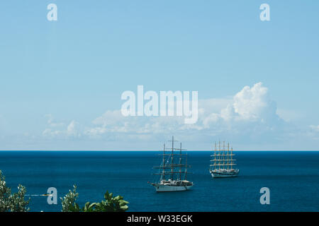 View of sailing ship off the coast, Amalfi Coast, Campania, Costiera Amalfitana, Italy Stock Photo