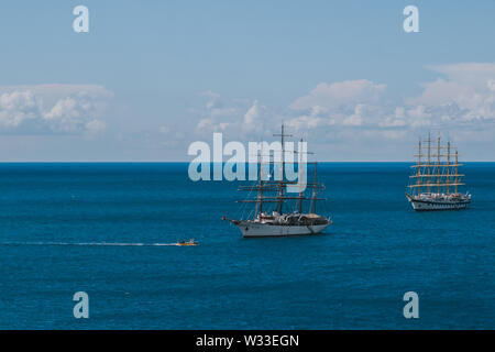 View of sailing ship off the coast, Amalfi Coast, Campania, Costiera Amalfitana, Italy Stock Photo