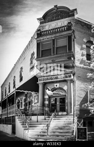 View of the historical Stock Exchange Saloon and Grill, formerly used as a brokerage house in the historical mining town of Bisbee, AZ Stock Photo