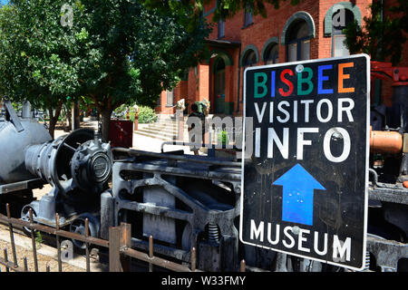 A sign for Bisbee Visitor Info and Bisbee Mining and Historical museum in small town America, the old mining town of Bisbee, AZ Stock Photo