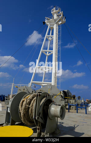 indian ocean, international waters - december 31, 2014: foremast and mooring winches on the forecastle of containership cma cgm vela (imo 9354923) Stock Photo