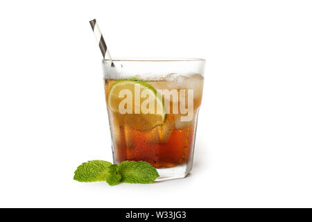 Glass of cold cola with lime isolated on white background Stock Photo