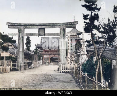 [ 1890s Japan - Shitennoji Temple, Osaka ] —   Torii, main gate and pagoda at Shitennoji Temple in Osaka.  19th century vintage albumen photograph. Stock Photo