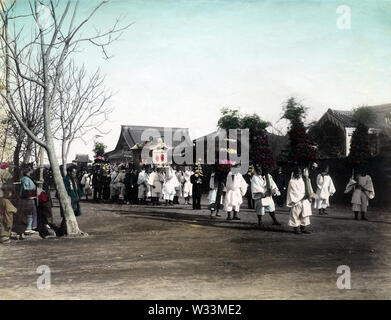 [ 1890s Japan - Japanese Funeral Procession ] —   Funeral procession on the street.  19th century vintage albumen photograph. Stock Photo