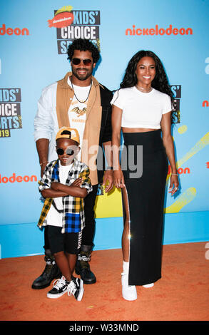 Santa Monica, California, USA. 11th July 2019. (L-R) Russell Wilson, Future Zahir Wilburn and Ciara arrive at the Nickelodeon Kids' Choice Sports Awards 2019 at Barker Hangar on July 11, 2019 in Santa Monica, California. Photo: imageSPACE/MediaPunch Credit: MediaPunch Inc/Alamy Live News Stock Photo