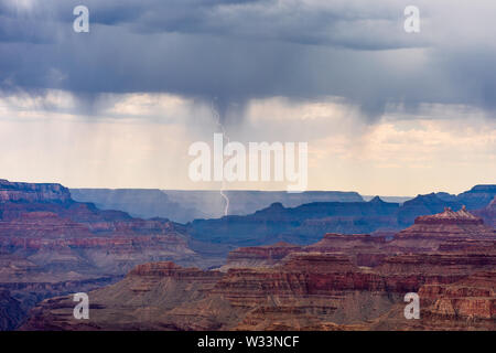 Lightning strikes from a storm moving across the Grand Canyon as viewed from Navajo Point, Grand Canyon National Park, Arizona, USA Stock Photo