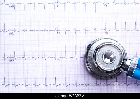 Stethoscope on cardiogram sheet Stock Photo