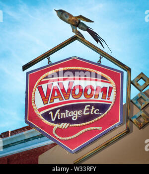 The VaVoom's colorful overhead store sign which includes an old rusty rocket ship on the frame, a unique antique and vintage shop, Bisbee, AZ, USA Stock Photo