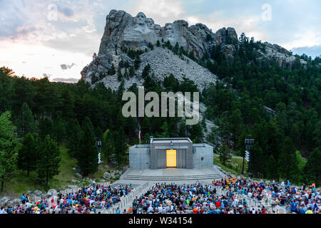 Visitors at the auditorium of Mount Rushmore National Monument Attending a ranger program Stock Photo