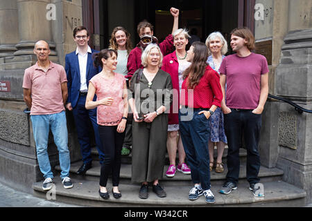 Climate change protesters gather outside City of London magistrates' court where 35 protesters are due to appear following the recent Extinction Rebellion protests in London. Stock Photo