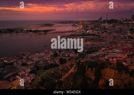 Luanda city by dust, aerial footage. Stock Photo