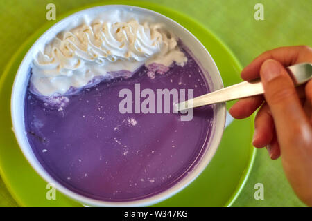 Traditional Hungarian cold fruit soup with cream in the restaurant in summertime Stock Photo