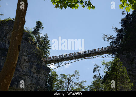 Neuschwanstein Casle near the village of Hohenschwangau in Germany. Inspiration for Walt Disney's fairy tale castle at Disneyland. Mary's Bridge. Stock Photo