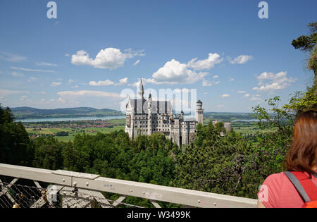 Neuschwanstein Casle near the village of Hohenschwangau in Germany. Inspiration for Walt Disney's fairy tale castle at Disneyland. Mary's Bridge. Stock Photo