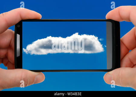 Cloud on a smartphone screen, cloud computing Stock Photo