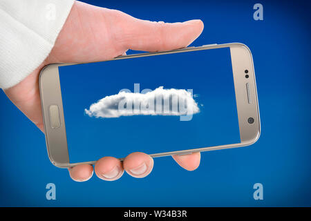 Cloud on a smartphone screen, cloud computing Stock Photo