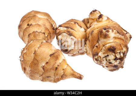 several Jerusalem artichokes (Topinambur) isolated on white background Stock Photo