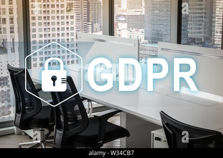 GDPR. Data Protection Regulation. Cyber security and privacy concept and Modern office with open space to work thought the window and background city. Stock Photo