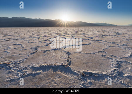 View of the Basins salt flats, Badwater Basin, Death Valley, Inyo County, California, United States. Salt Badwater Formations in Death Valley National Stock Photo