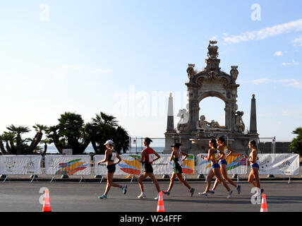 Naples, Italy. 12th July, 2019. Athletes compete during the final match of Women's 20km Walk at the 30th Summer Universiade in Naples, Italy, July 12, 2019. Credit: Kong Hui/Xinhua/Alamy Live News Stock Photo
