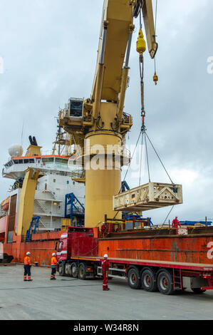 Normand Clipper berthing and putting ashore decommissioned oil rig ...