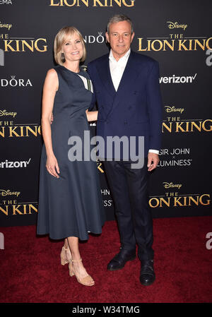 HOLLYWOOD, CA - JULY 09: Willow Bay and The Walt Disney Company Chairman and CEO Bob Iger  attends the premiere of Disney's 'The Lion King' at the Dol Stock Photo