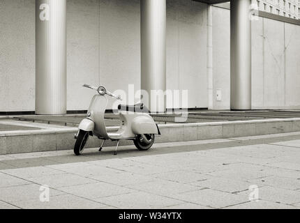 Scooter on the roadside in Berlin Stock Photo