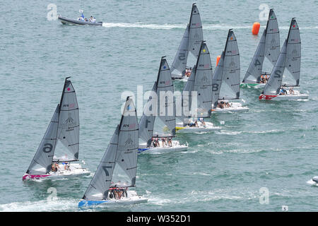 Naples, Italy. 12th July, 2019. Sailors start during the final of RS21 Mixed Fleet Racing of Sailing at the 30th Summer Universiade in Naples, Italy, July 12, 2019. Credit: Zheng Huansong/Xinhua/Alamy Live News Stock Photo