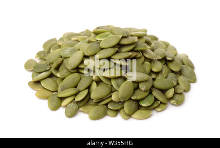 Heap of fresh shelled pumpkin seeds isolated on white Stock Photo