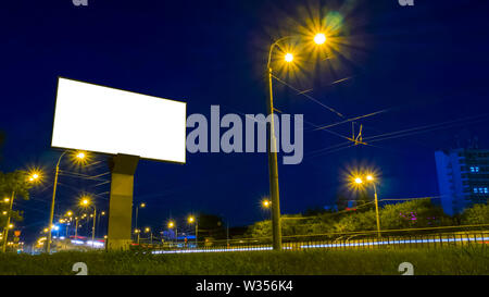 Mockup white empty screen billboard on highway with traffic Stock Photo