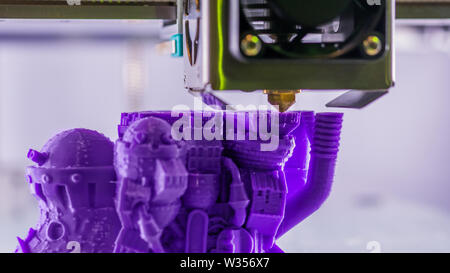 Three dimensional printing machine prints physical 3D model Stock Photo