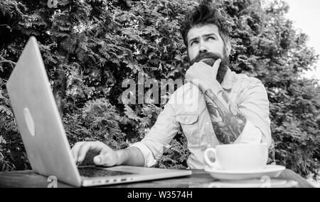 Keep on blogging. Bearded man blogging on popular social network. Amateur journalist blogging and writing articles. Blogging and advertising. Stock Photo