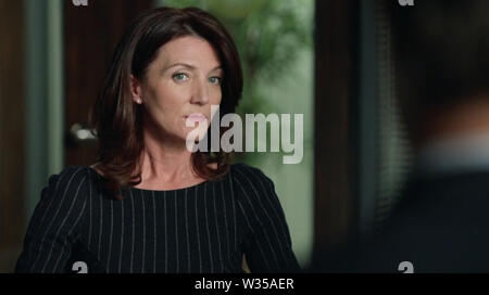 Los Angeles.CA.USA. Michelle Fairley in a guest tole  in a scene in ©USA Network/NBC Universal TV series, Suits (TV) (S3E1) (2013) Creator:Aaron Korsh Season Start: 2011 Current Season: S7 2017. Note:Meghan Markle announced engagment to Prince Harry 27.11.2017.  Ref:LMK112-SLIB041217-001 Supplied by LMKMEDIA. Editorial Only. Landmark Media is not the copyright owner of these Film or TV stills but provides a service only for recognised Media outlets. pictures@lmkmedia.com