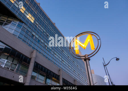 Illuminated metro sign at dusk, Bastille, Paris, France. Stock Photo