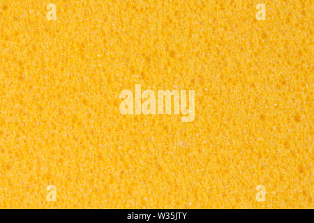 Contrast yellow foam EVA texture with porous surface. High quality texture in extremely high resolution. Stock Photo